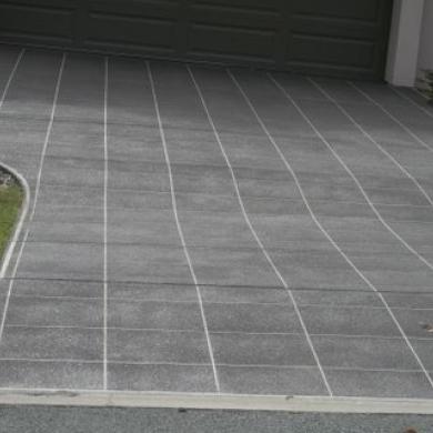 Functional, attractive concrete driveways. Blend durability and aesthetics for welcoming entryways.