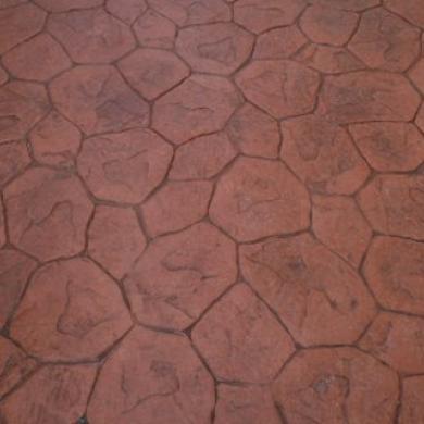 Add texture with stamped concrete finishes. Decorative surfaces resembling stone, brick, or wood.